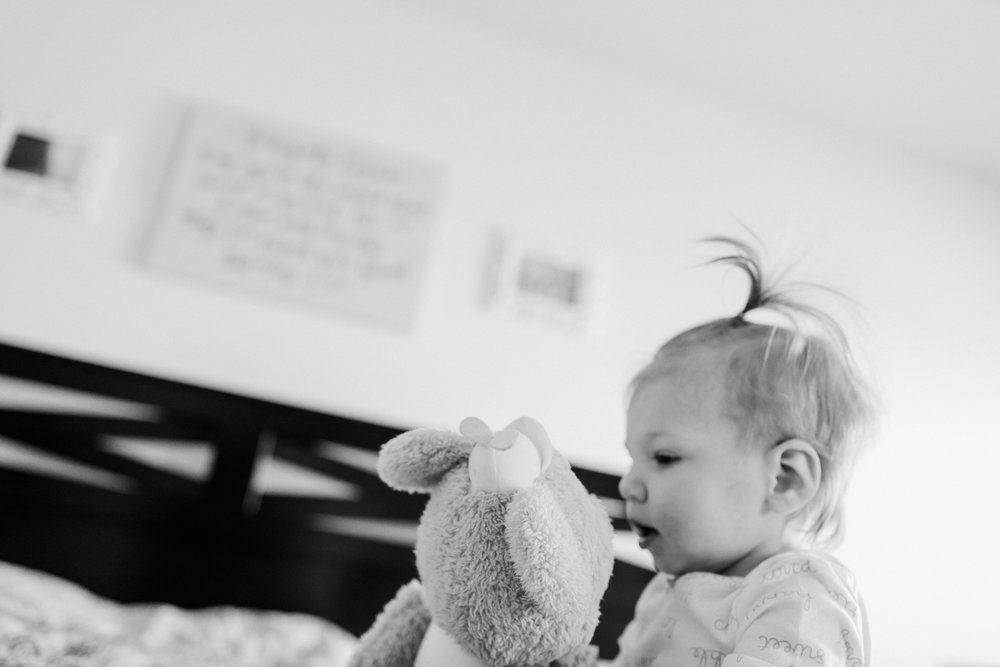 3 year old photographer taking pictures of her family