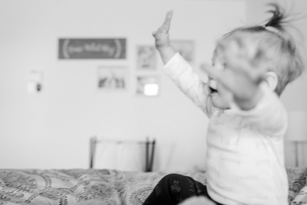 3 year old photographer taking pictures of her family