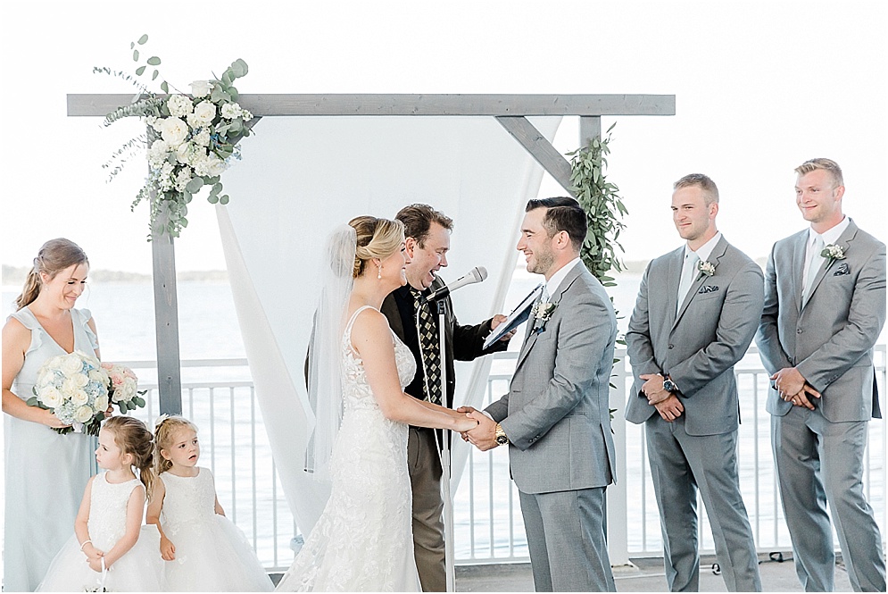 A wild Hyatt wedding where the ceremony took place on a dock on the Choptank River in Cambridge, Maryland.