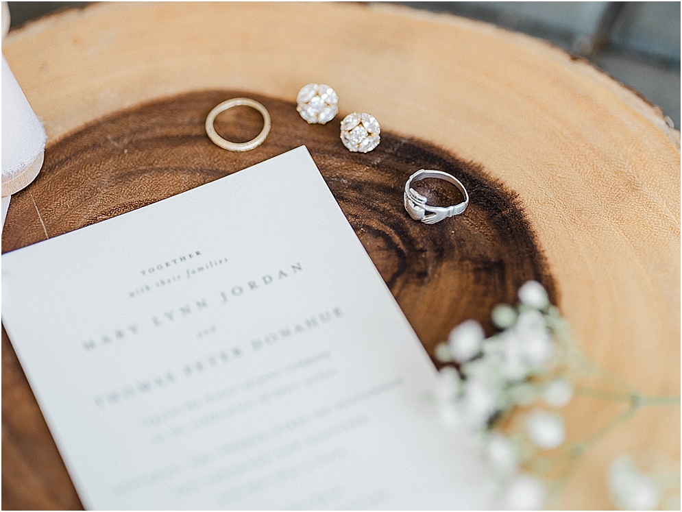 A playful Annapolis backyard wedding on the water featuring twinkle lights and greenery.