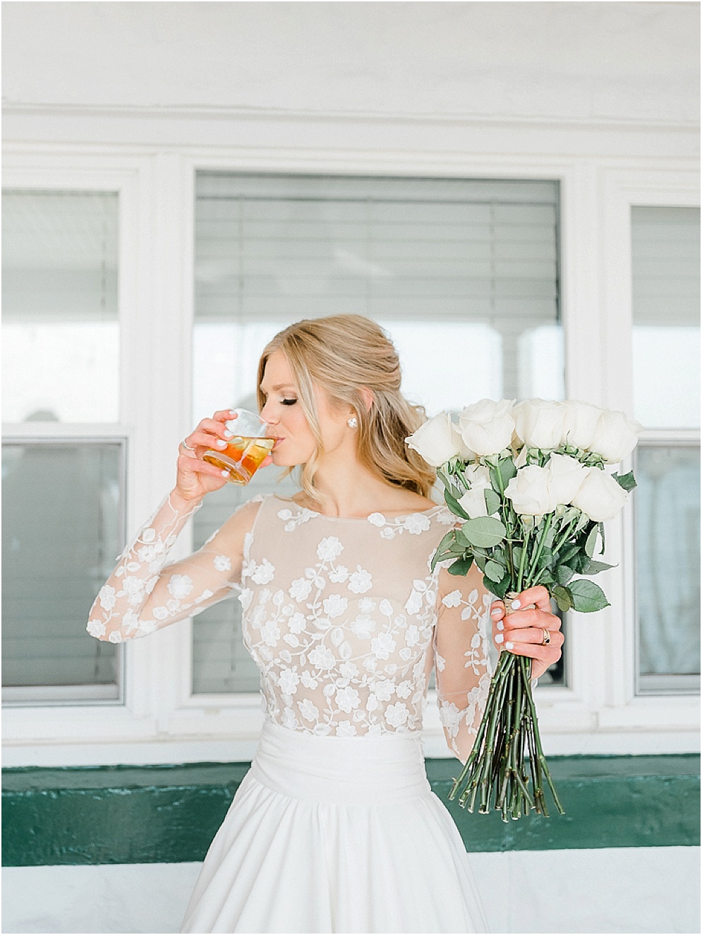 A playful Annapolis backyard wedding on the water featuring twinkle lights and greenery.