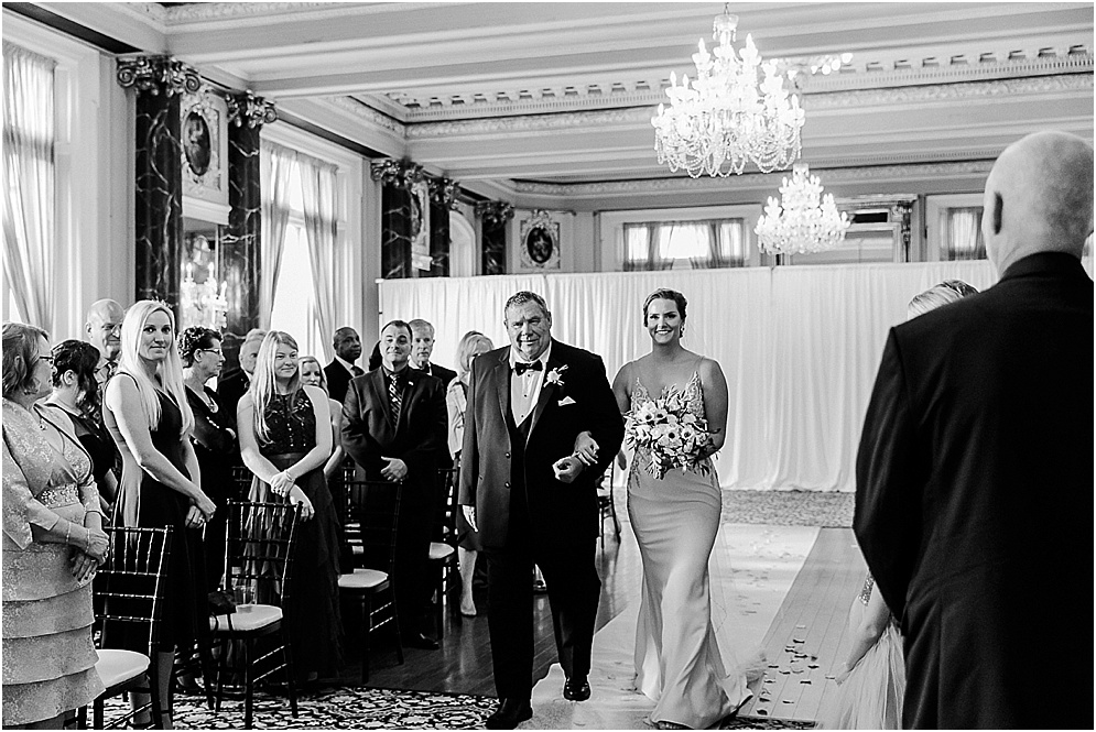 A black and gold Great Gatsby themed wedding at the Belvedere Hotel in Baltimore, Maryland.