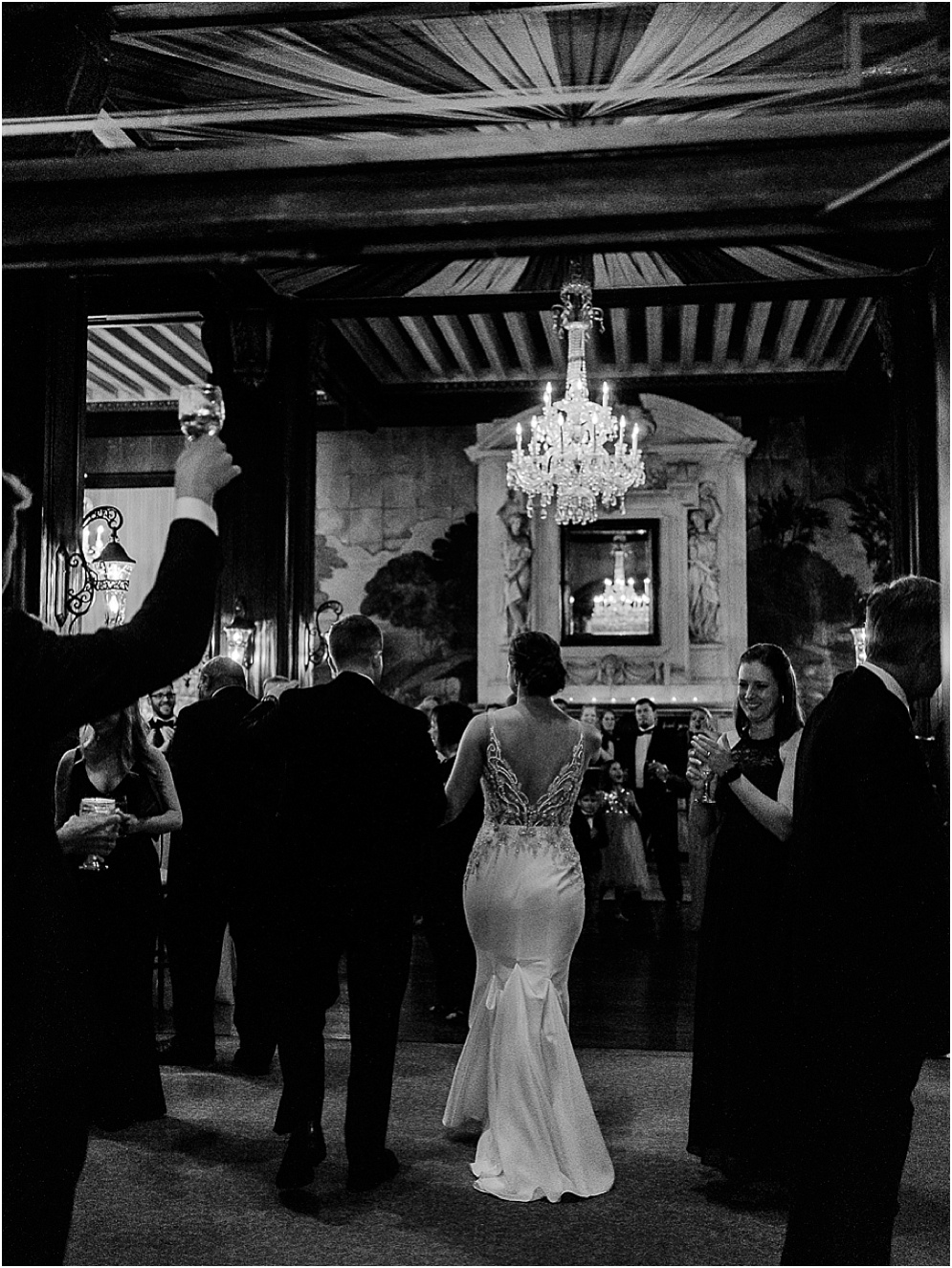 A black and gold Great Gatsby themed wedding at the Belvedere Hotel in Baltimore, Maryland.