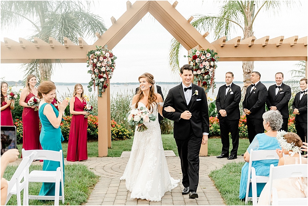 An elegant wedding at Herrington on the Bay, which is an Annapolis waterfront wedding venue. This wedding used reds & blushes to add romance.