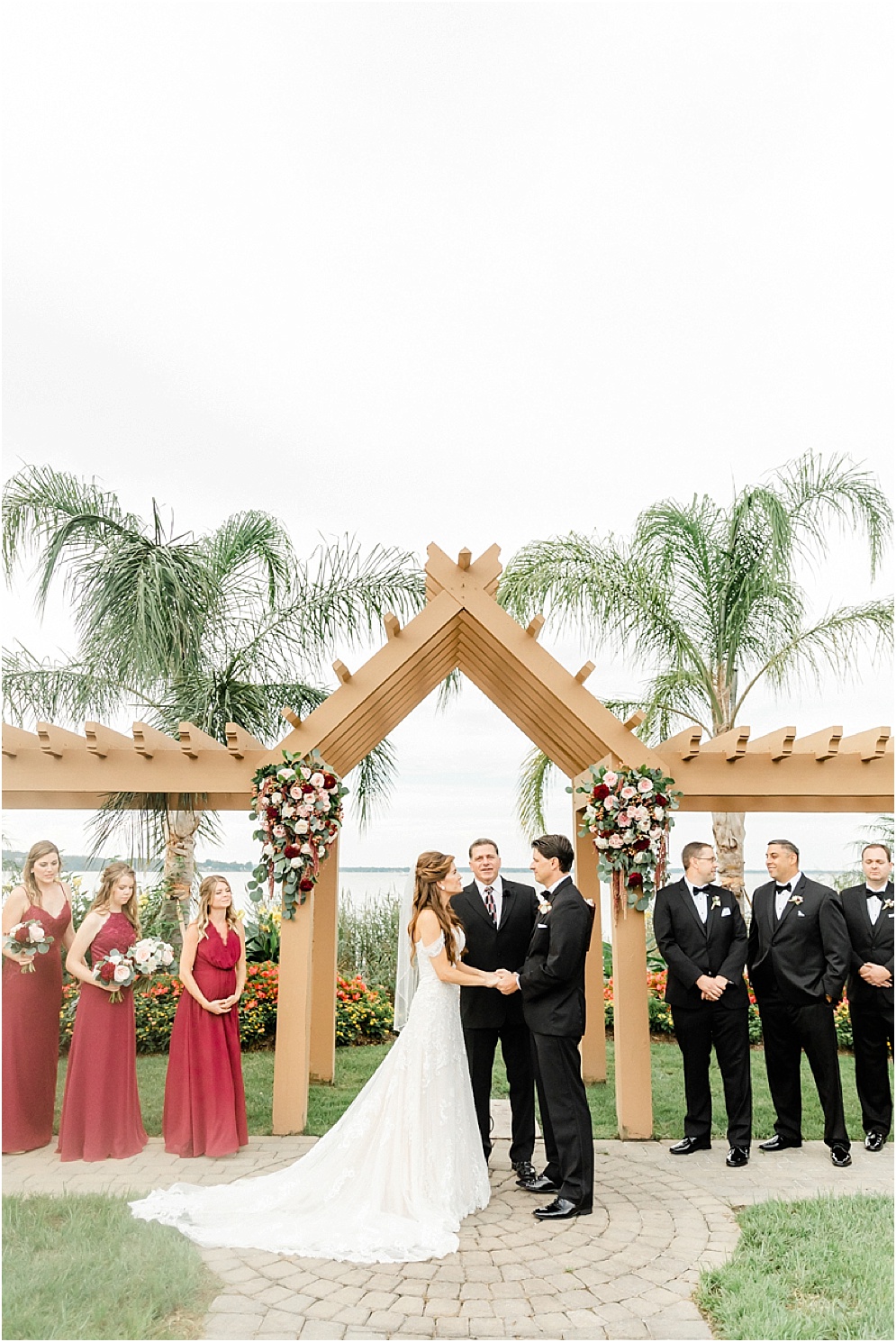 An elegant wedding at Herrington on the Bay, which is an Annapolis waterfront wedding venue. This wedding used reds & blushes to add romance.