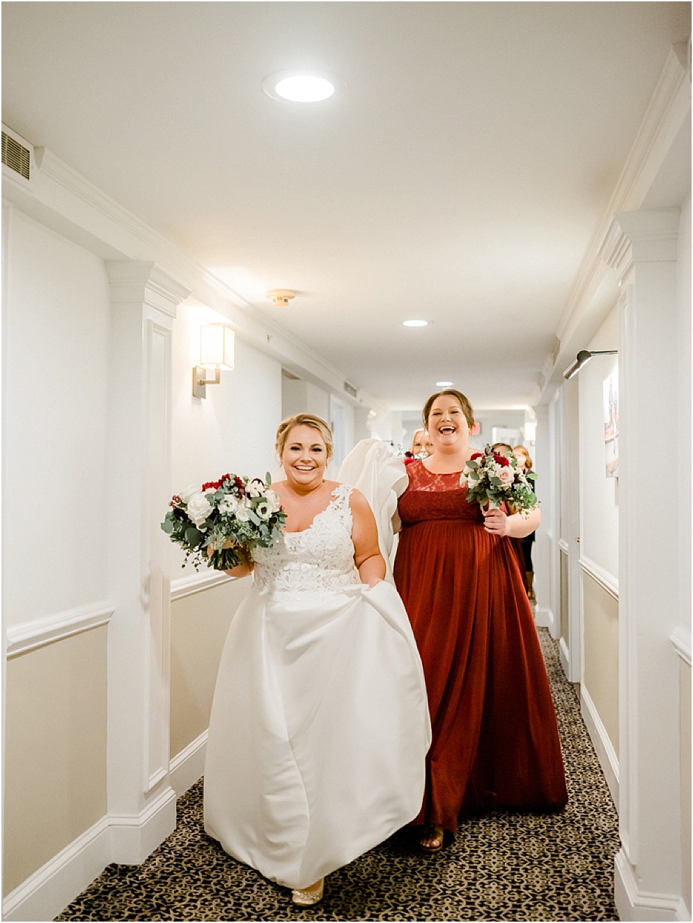 An Eastern Shore wedding in Downtown Easton, featuring deep red and purple hues and an incredibly joyful couple.