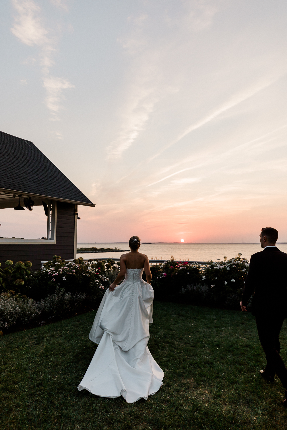 A classic, elegant waterfront wedding with gold bridesmaid dresses on the Chesapeake Bay in Maryland.