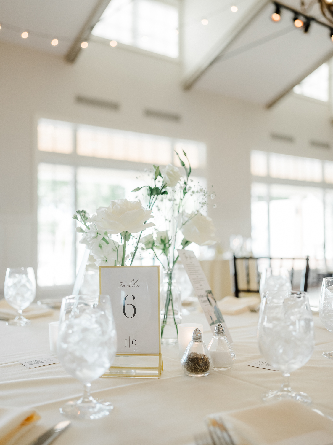 A classic, elegant waterfront wedding with gold bridesmaid dresses on the Chesapeake Bay in Maryland.