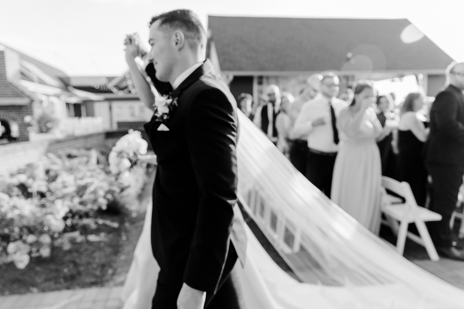 A classic, elegant waterfront wedding with gold bridesmaid dresses on the Chesapeake Bay in Maryland.