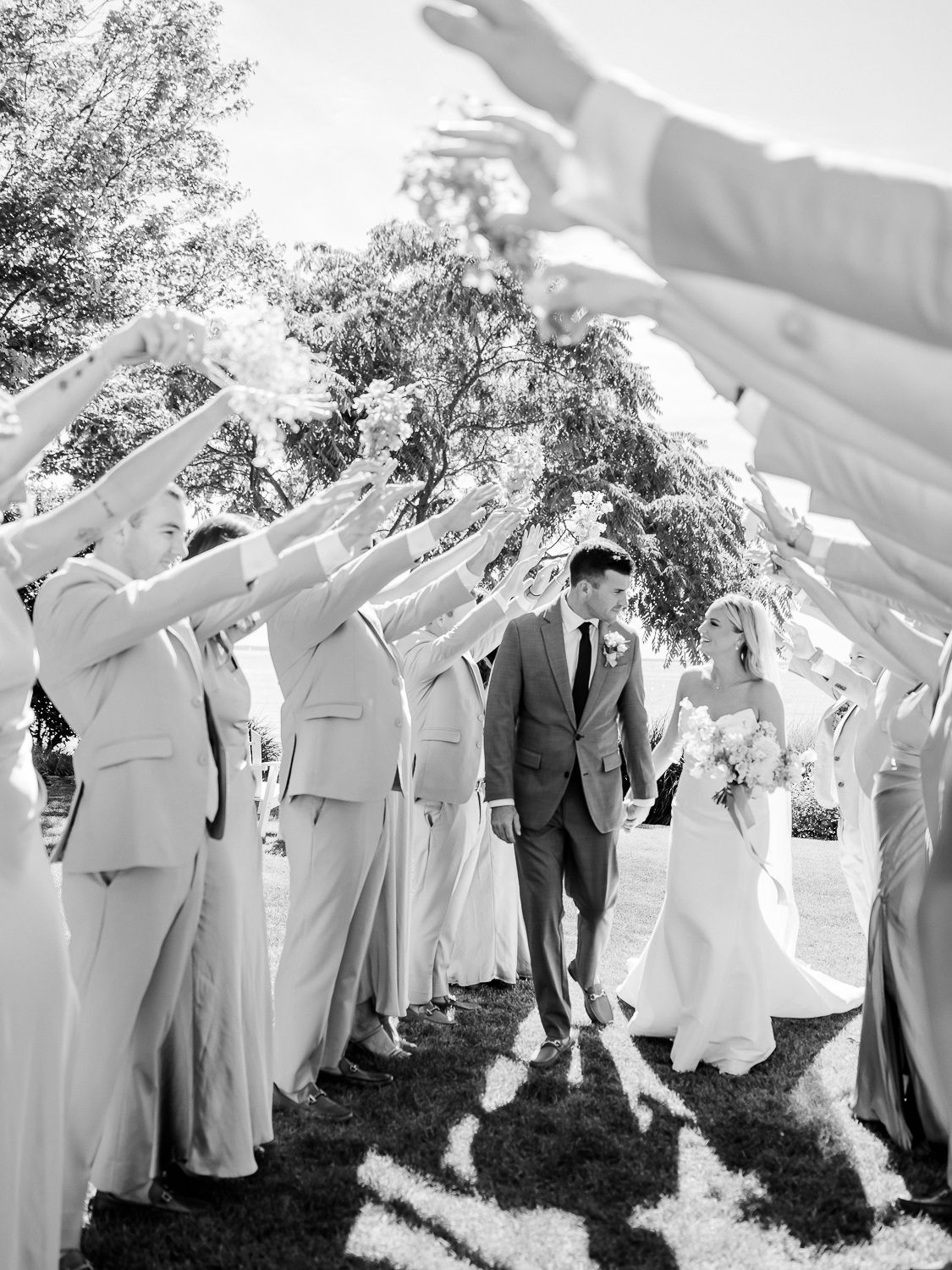 A white and baby blue coastal, chic wedding with romantic touches on the Chesapeake Bay on the Eastern Shore of Maryland.